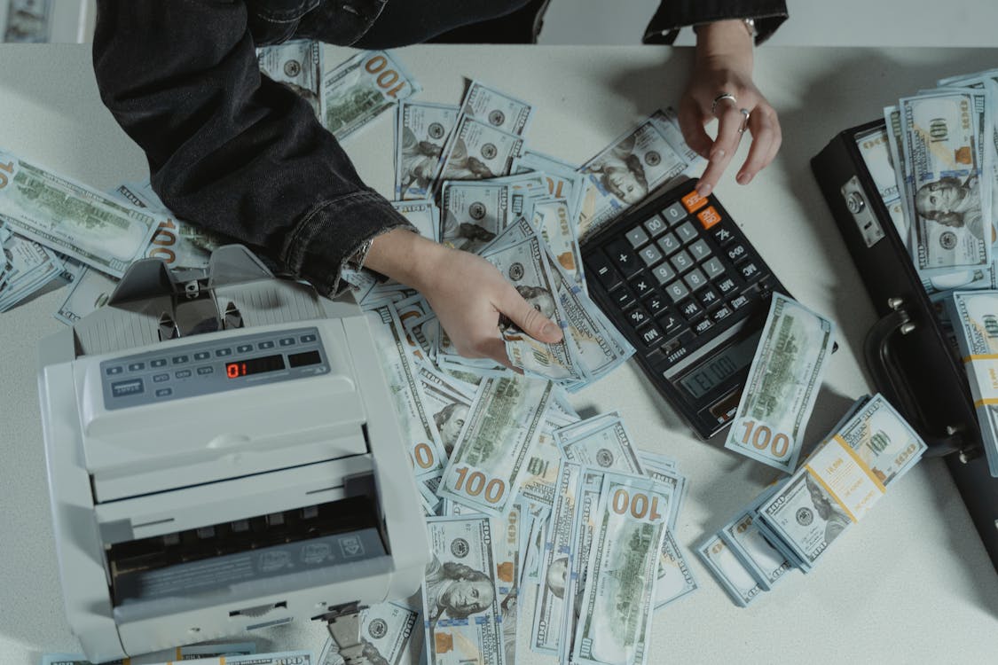 an image depicting money, a magnet for fraudsters