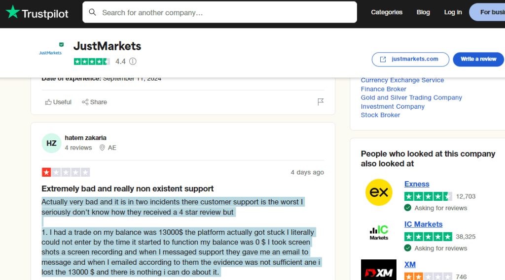 Negative review of JustMarkets on Trustpilot.